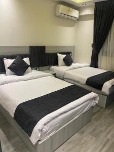 Postel nebo postele na pokoji v ubytování banorama hotel apartments