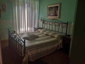 Ένα ή περισσότερα κρεβάτια σε δωμάτιο στο Olympus