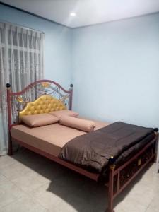 Кровать или кровати в номере Wel home stay