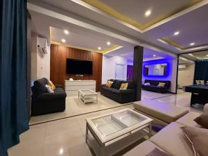 Χώρος καθιστικού στο Elegante 4-Zi-Poolvilla mit Strandzugang