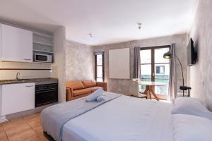 Η κουζίνα ή μικρή κουζίνα στο Loft by Unik Vacation