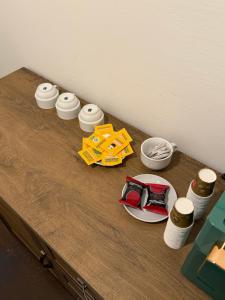 a wooden table with a group of items on it at Sc Residence Parma in Parma