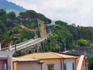 a view of a city with a mountain at Olympus in Paola