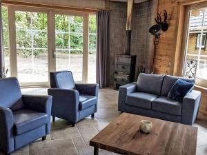 Χώρος καθιστικού στο Holiday Home De Bosuil by Interhome