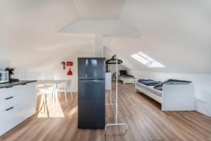 Kuchyň nebo kuchyňský kout v ubytování Gemütlich wohnen wie zu Hause - perfekt für Montage, Geschäftsreisen und Langzeitaufenthalte - SCH06 + 2 fotografie