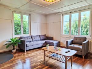 Posezení v ubytování Chalet Haus am See 4B by Interhome + 33 fotografií