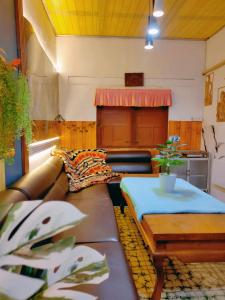 Χώρος καθιστικού στο Secation Homestay & Kost