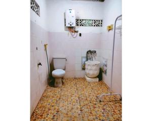 Ένα μπάνιο στο Secation Homestay & Kost