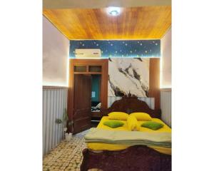 Ένα ή περισσότερα κρεβάτια σε δωμάτιο στο Secation Homestay & Kost