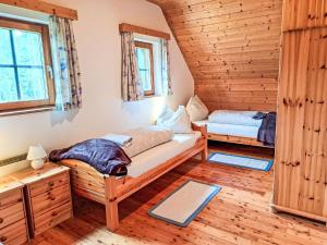 Ένα ή περισσότερα κρεβάτια σε δωμάτιο στο Holiday Home Simale by Interhome