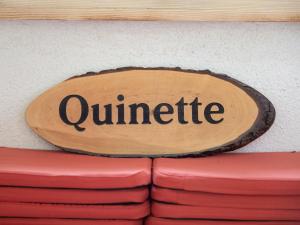 a sign on a wall with the wordunknife at Chalet Quinette by Interhome in Ovronnaz