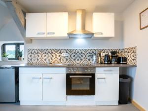 Η κουζίνα ή μικρή κουζίνα στο Apartment King George III by Interhome