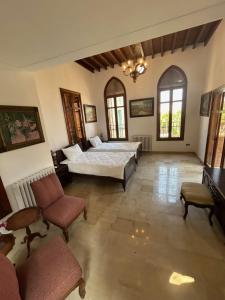 Postel nebo postele na pokoji v ubytování Villa Ivy + 49 fotografií