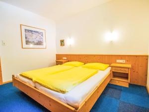 Ένα ή περισσότερα κρεβάτια σε δωμάτιο στο Apartment Am Weitfeld-2 by Interhome