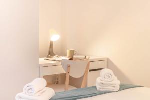 Katil atau katil-katil dalam bilik di Gran apartamento tipo loft a 15 minutos del centro