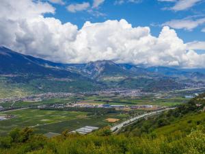 a view of a valley with a mountain at Chalet Oxygène by Interhome in Plan Fey