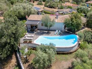 an aerial view of a house with a swimming pool at Holiday Home Chidda Di by Interhome in Trudda