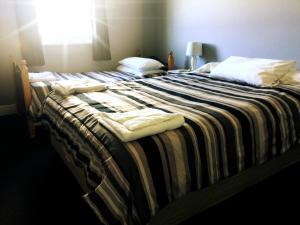 Kearsley Hotel客房内的一张或多张床位
