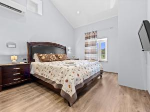 Ένα ή περισσότερα κρεβάτια σε δωμάτιο στο Holiday Home Susan & David by Interhome