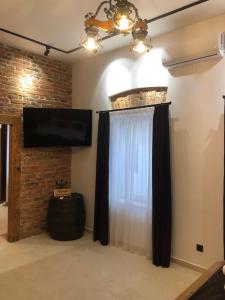 Μια τηλεόραση ή/και κέντρο ψυχαγωγίας στο Napoca Brick&Barrel +34 φωτογραφίες