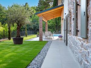 Aed väljaspool majutusasutust Villa Eva by Interhome +34 fotot