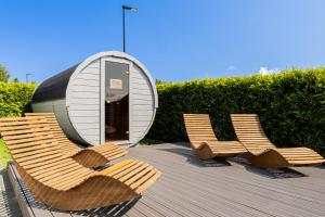 Φωτογραφία από το άλμπουμ του Domki Leśne Zacisze - Domki z Sauną i Basenem σε Jastrzębia Góra