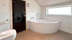 Koupelna v ubytování Avalon Ferienpark Bad Bevensen + 10 fotografií