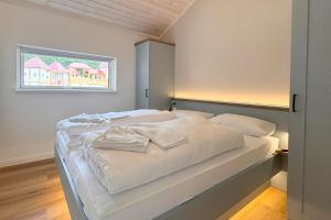 Postel nebo postele na pokoji v ubytování Avalon Ferienpark Bad Bevensen