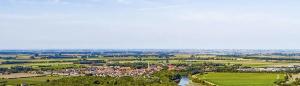an aerial view of a town and a river at Vakantiepark de Zeeuwse Parel - Zeeparel in Sint Maartensdijk +3 photos