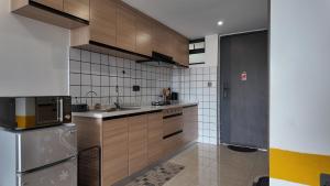 Kuchyň nebo kuchyňský kout v ubytování Ruaka studio apartment with a pool