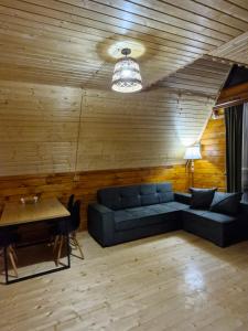 Posezení v ubytování Cozy Cottage B