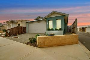 a house on the side of a street at Seascape Beach House Retreat in Falcon