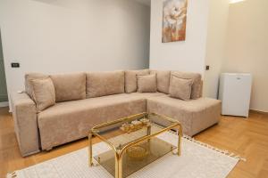 a living room with a couch and a coffee table at The Blue House in Široka +33 photos