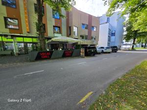 a food stand on the side of a city street at Willa Ranna Resort in Pärnu +7 photos