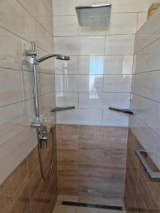 Ένα μπάνιο στο Tameli Delux Apartman +52 φωτογραφίες