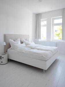 Postel nebo postele na pokoji v ubytování Villa 52