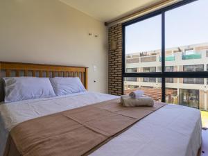 Una cama o camas en una habitación de Trino do Maro - Atins