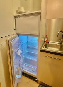 Kuchyň nebo kuchyňský kout v ubytování Arsenal, 2 rooms - Port-Opéra-Gare