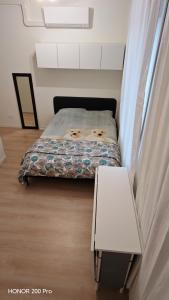 Ένα ή περισσότερα κρεβάτια σε δωμάτιο στο Stylish Studio with Kitchen Lille