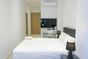 Μια τηλεόραση ή/και κέντρο ψυχαγωγίας στο RR Cozy Studio & Suite