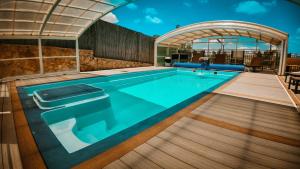 a swimming pool on the deck of a cruise ship at צימרים מצפה חרמון in Majdal Shams