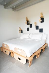 Postel nebo postele na pokoji v ubytování B&B Panevì