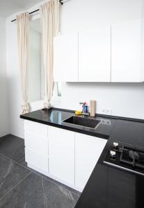 Kuchyň nebo kuchyňský kout v ubytování Best location, stylish and modern + 2 fotografie