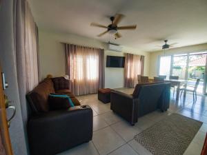 a living room with a couch and a table at Casa Costamar 