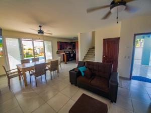 a living room with a couch and a table at Casa Costamar 