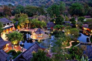 an aerial view of a resort at night at Sibsan Resort & Spa Maetaeng Chiang Mai in Mae Taeng