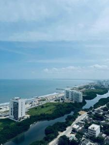 an aerial view of a city and a body of water at Villas del mar in Cartagena de Indias