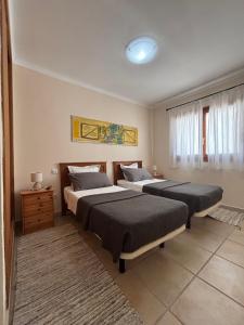 Ένα ή περισσότερα κρεβάτια σε δωμάτιο στο Villa Sanchez +23 φωτογραφίες