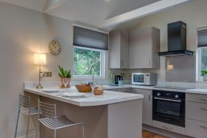 Kuchyň nebo kuchyňský kout v ubytování The Garden Cottage + 7 fotografií