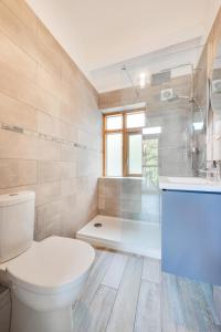Ένα μπάνιο στο Apartment 4 The Old Stables